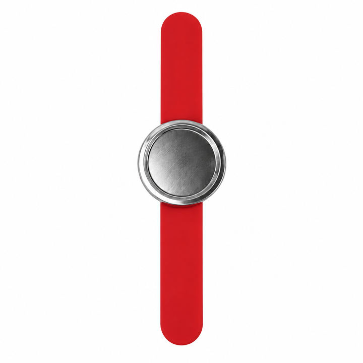 A minimalist wristwatch featuring a vibrant red silicone strap and a round silver-tone metal bezel with a brushed metallic center, shown against a plain white background.