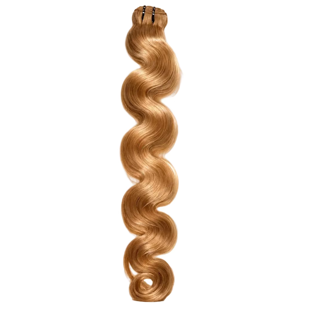 A bundle of body wave hair extensions in a light golden blonde color, laid flat on a white sheet of paper on a desk.