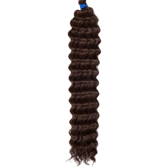 A packaged synthetic hair extension with a curly texture, branded &