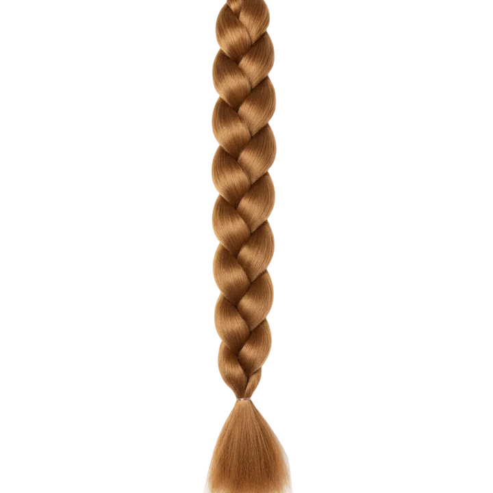 A single long braided hair extension or braid piece in a warm light brown shade, centered on a plain white background.