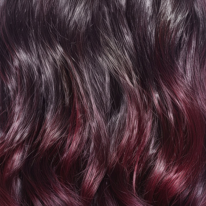 A straight black synthetic hair extension.